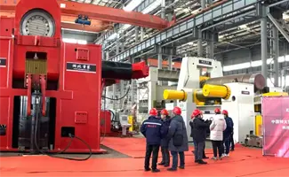 The First Super-large Wind Power Intelligent Coil Forming System in China the Scientific and Technological Achievement Review and Product Launch Conference Were Successfully Held in EZHONG - 翻译中...
